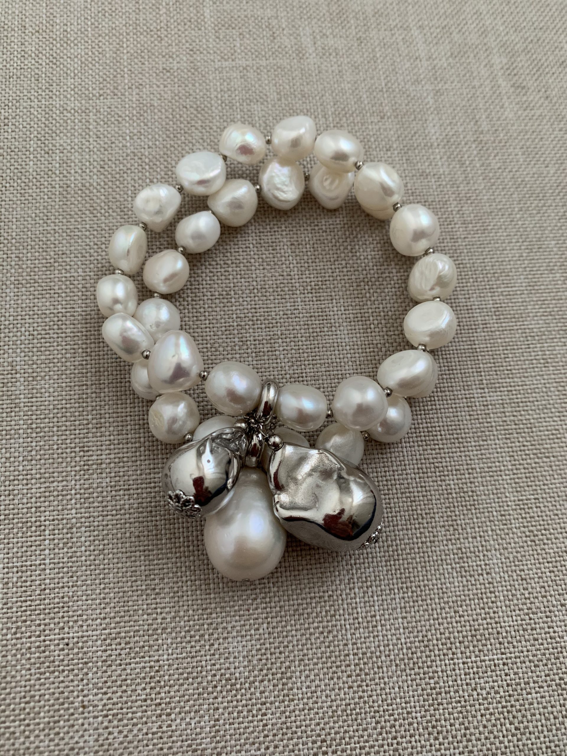 Bracciale elastico a 2 fili di perle e argento rodiato