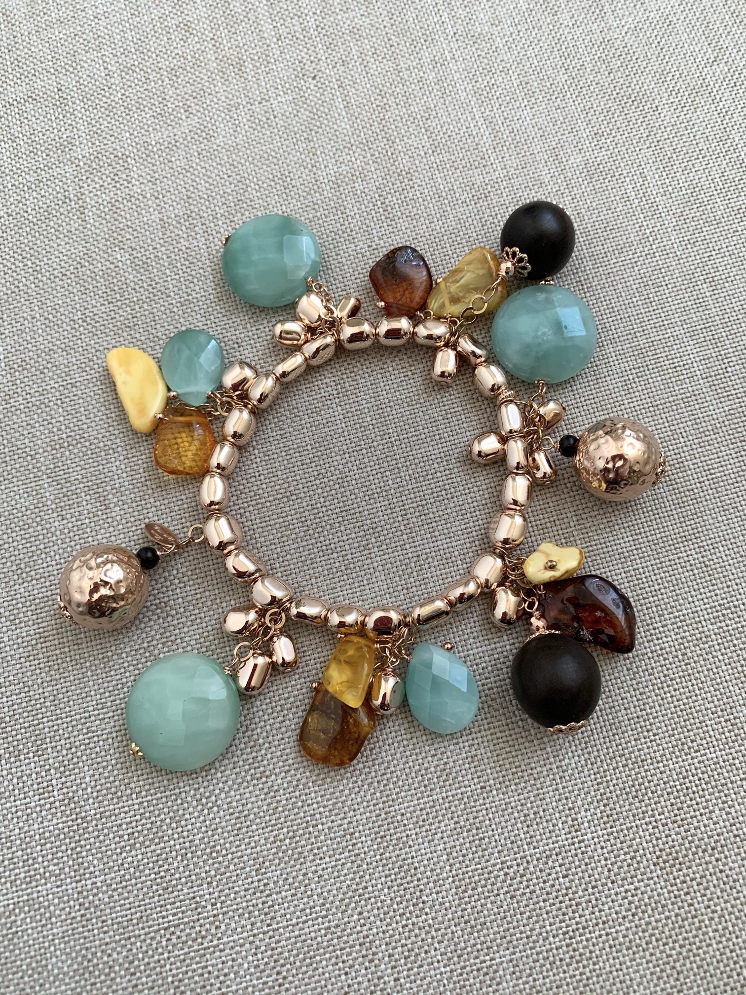 Bracciale elastico ematite rose' con ciondoli ambra, giada ebano e argento placcato oro rosa
